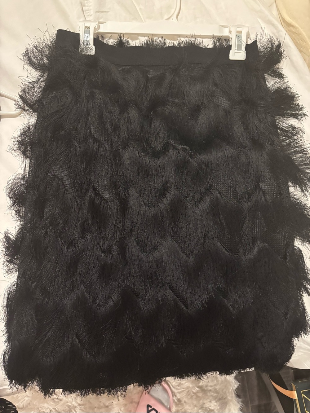 Mid length skirt with tassels and elastic waistband
